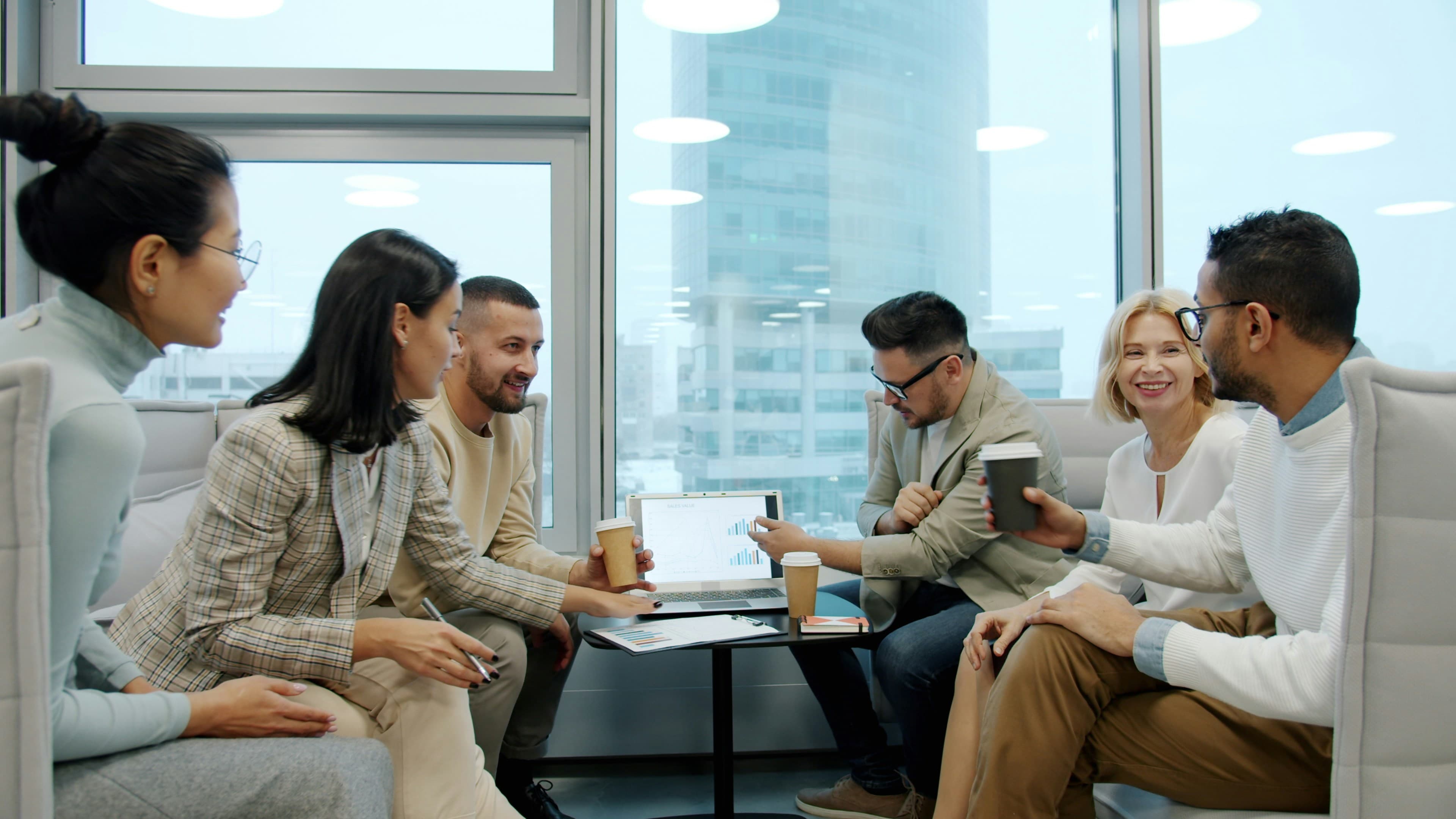 Team of consultants meeting in a modern office