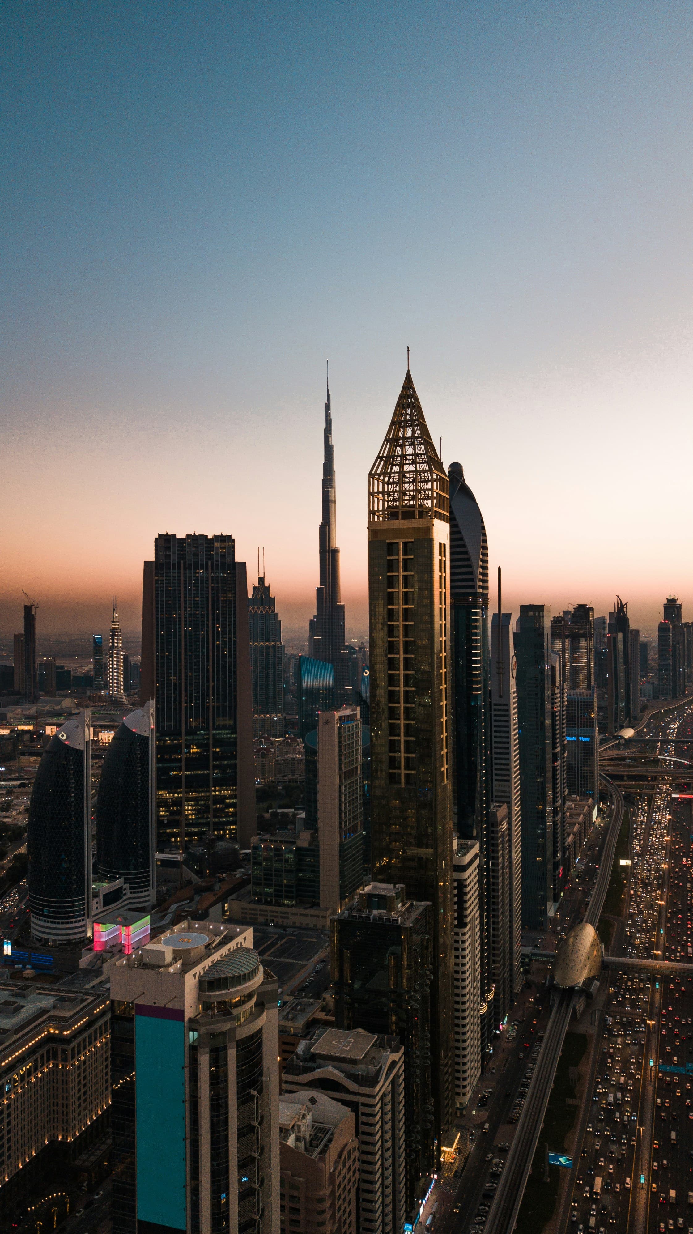 Sheikh Zayed Road business district skyline in Dubai at dusk